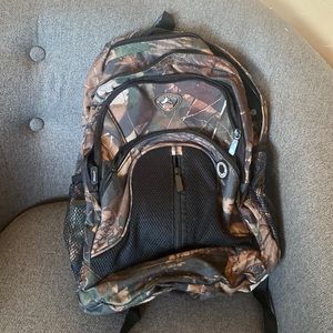 Camo backpack with extra straps and storage